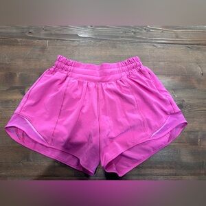 Pink lululemon hotty hot shorts